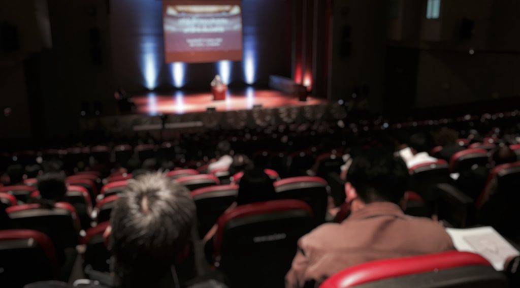 tedx event blurred on stage